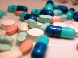 Various pills representing a minimum effective dose of medicine